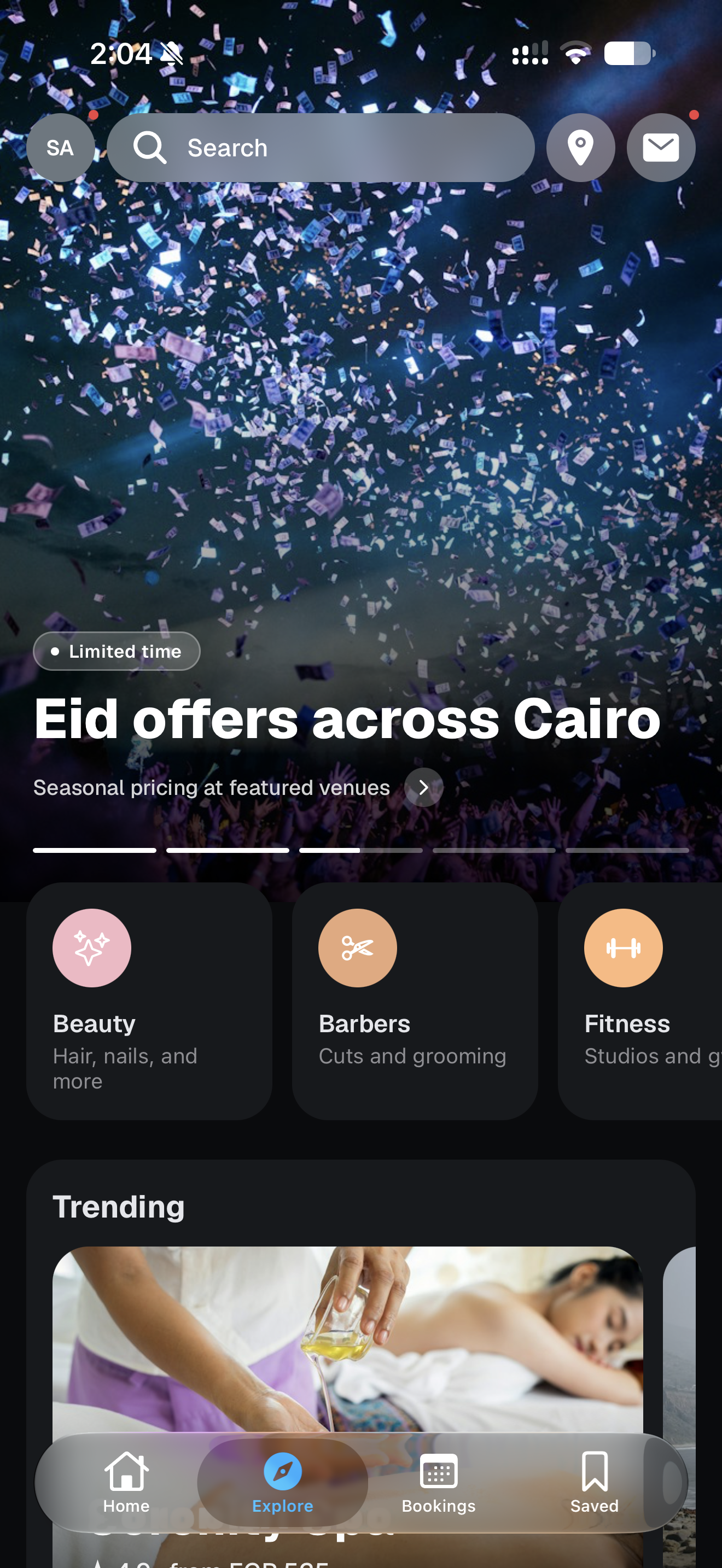 The Rezrv app’s Explore screen: a search bar over a banner for Eid offers across Cairo, then categories and trending places
